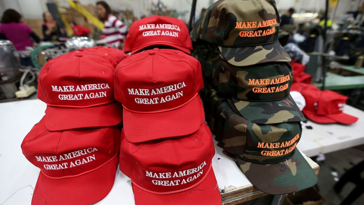 Ball caps are only a small part of the catalog of items bearing President Trump's campaign slogan.