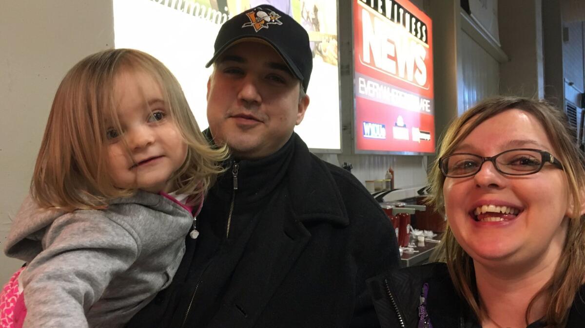 Jeanne Laktash, with husband Nick Laktash and 2-year-old daughter Kateri, says President Trump "has no idea what he's doing," but she does not expect his supporters to change their minds.