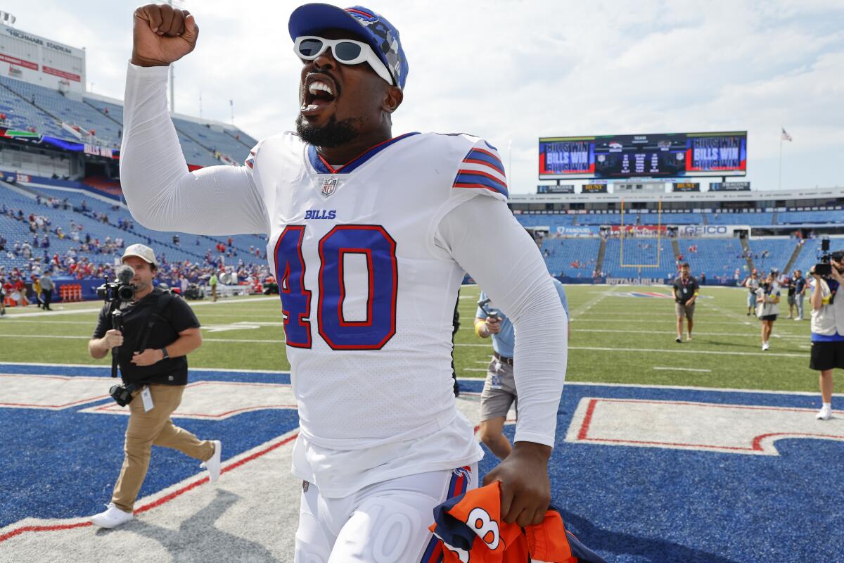 Buffalo Bills' Von Miller reacts as he leaves the field after a preseason Ngame against the Denver Broncos.