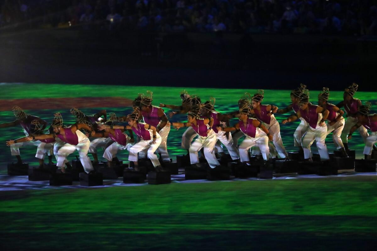 Dancers perform during the opening ceremony of the Rio 2016 Olympic Games.