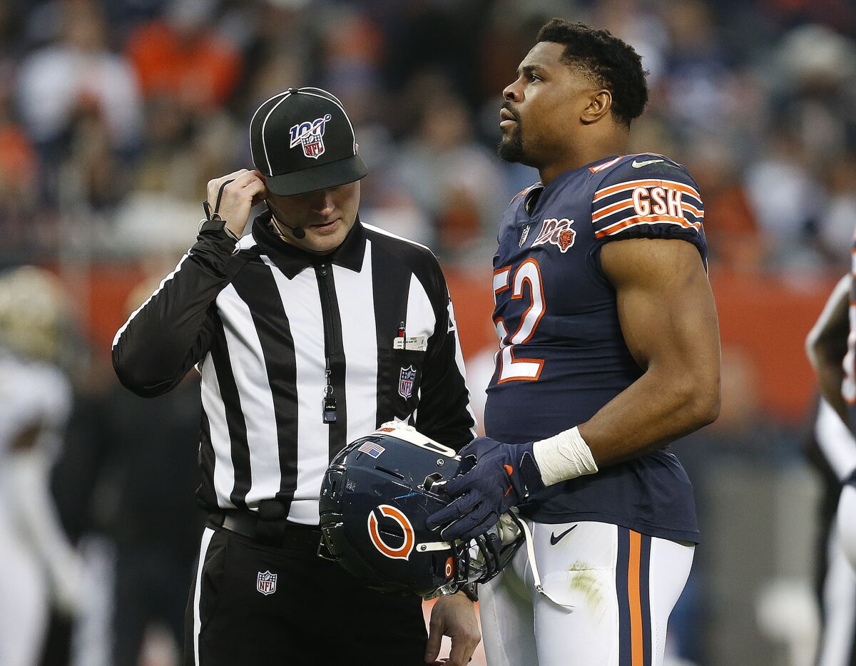 The Bears' Khalil Mack talks to an official during Chicago's 36-25 loss to New Orleans on Oct. 20.