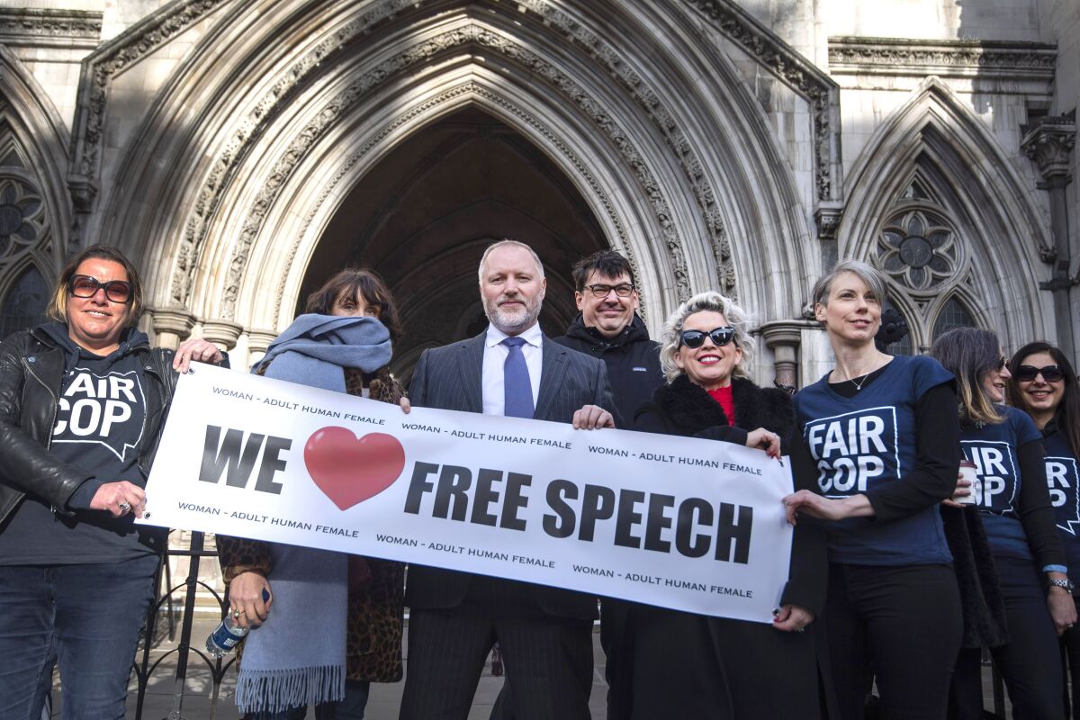 Former police officer Harry Miller arrives outside the High Court, London, Friday, Feb. 14, 2020. A British court ruled Friday that police infringed a man’s right to free expression when they showed up at his workplace to quiz him about his Twitter posts about transgender people. Humberside Police in northeast England investigated Harry Miller in January 2019 after receiving a complaint about allegedly “transphobic” tweets, including a limerick mocking the idea that transgender women are biologically women. (Victoria Jones/PA via AP)