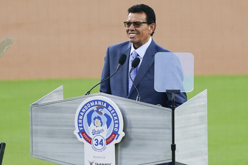 Former Los Angeles Dodgers pitcher Fernando Valenzuela speaks during his jersey retirement ceremony.