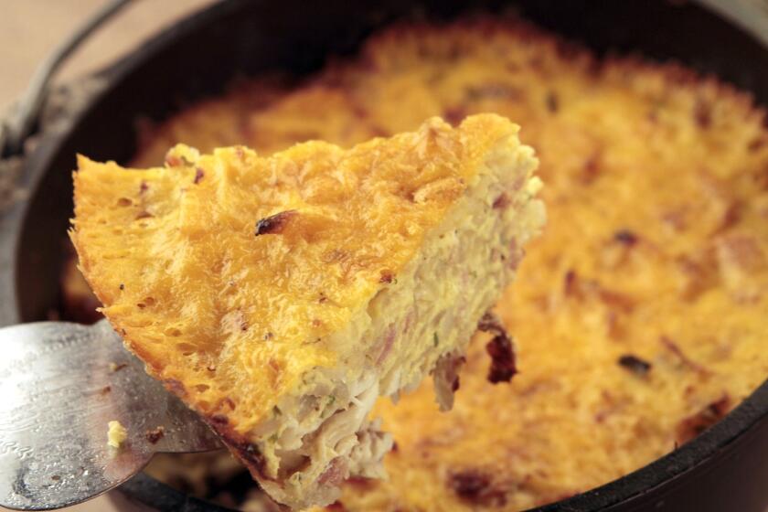 Frittata is a great way to start the morning while camping. Simply sauté chopped bacon with onion and grated potato, stir in the eggs and bake until puffed and golden. Shredded cheese is melted on top.