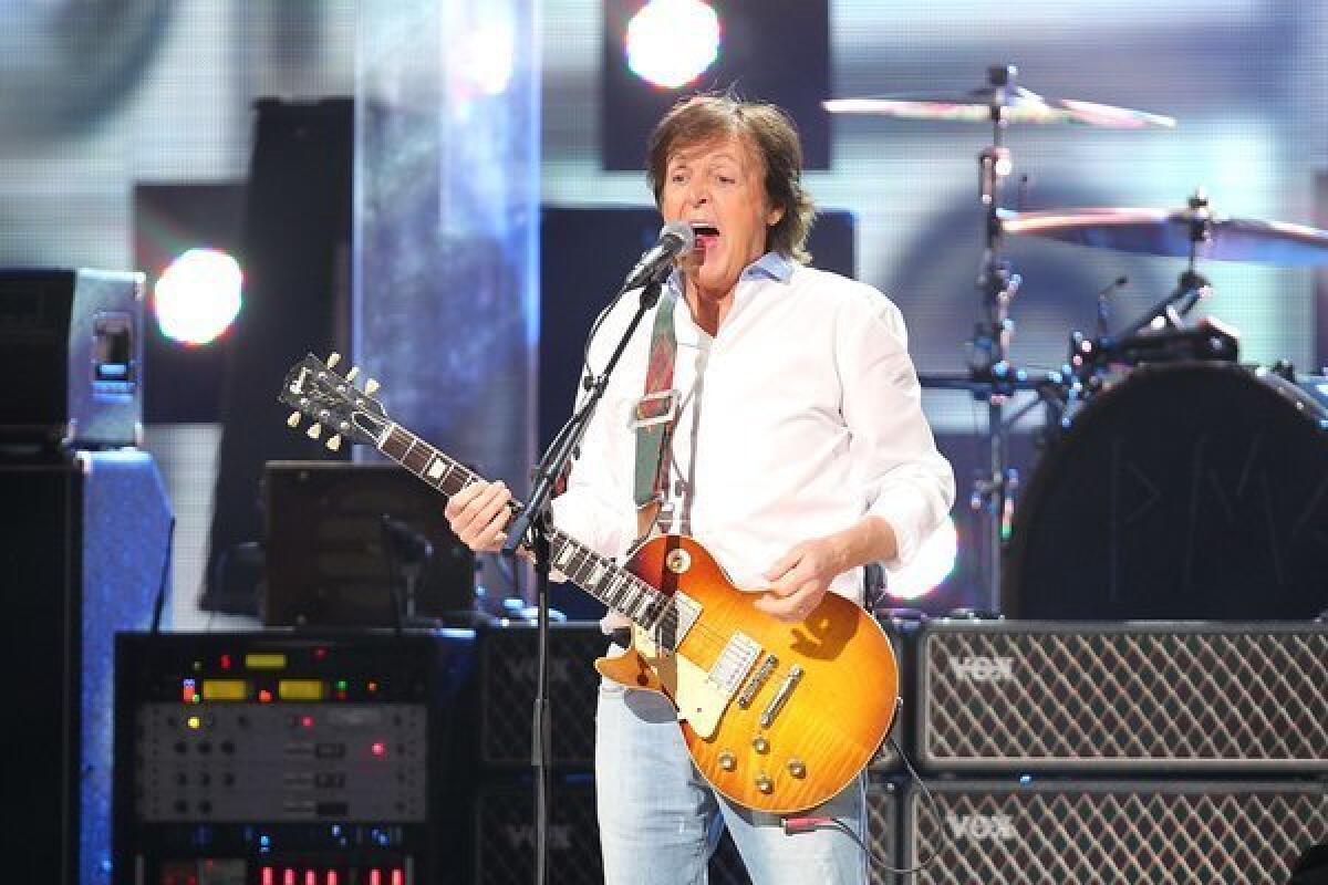 Paul McCartney, shown performing Wednesday in New York, has a new recording that will premiere Sunday on "Breakfast With the Beatles" in Los Angeles.