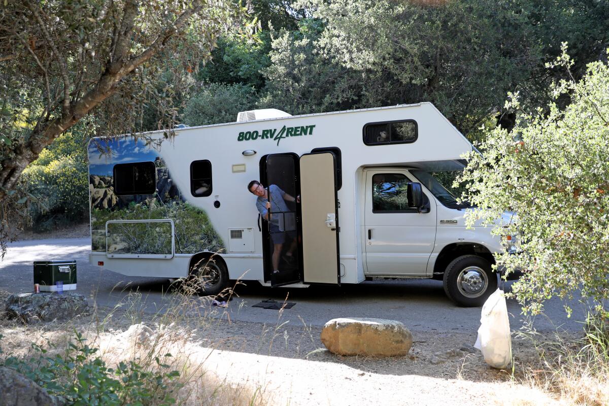 Staff writer Daniel Miller prepares for dinner while RV camping at Wheeler Gorge Campground.