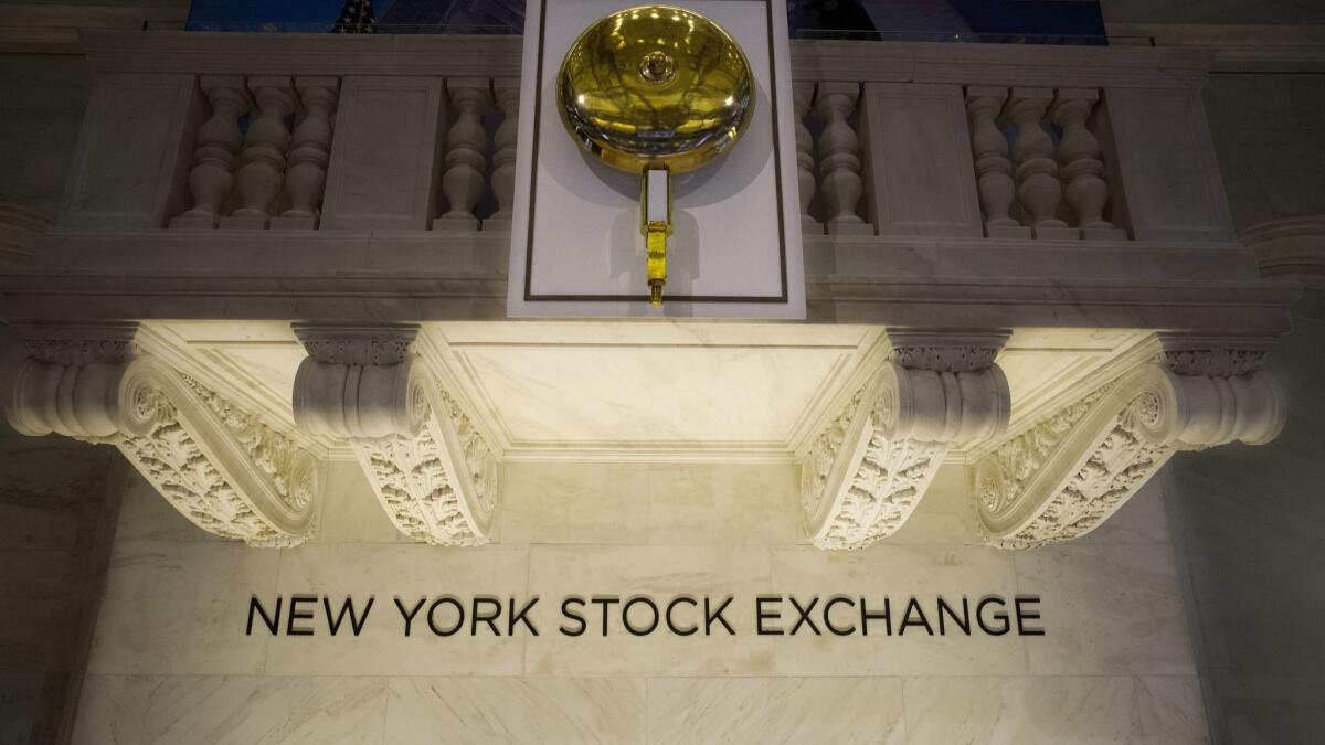 The opening bell hangs above the trading floor at the New York Stock Exchange.