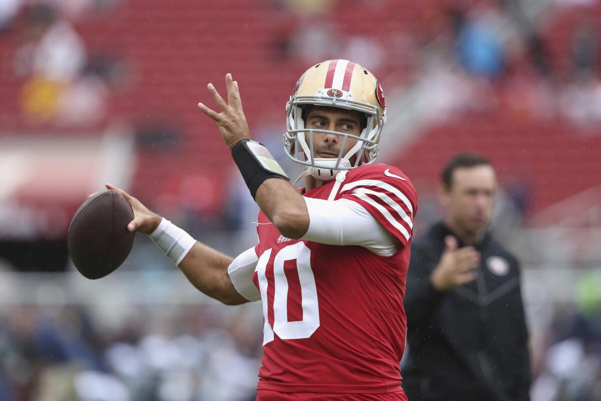 San Francisco 49ers quarterback Jimmy Garoppolo warms up before a game.