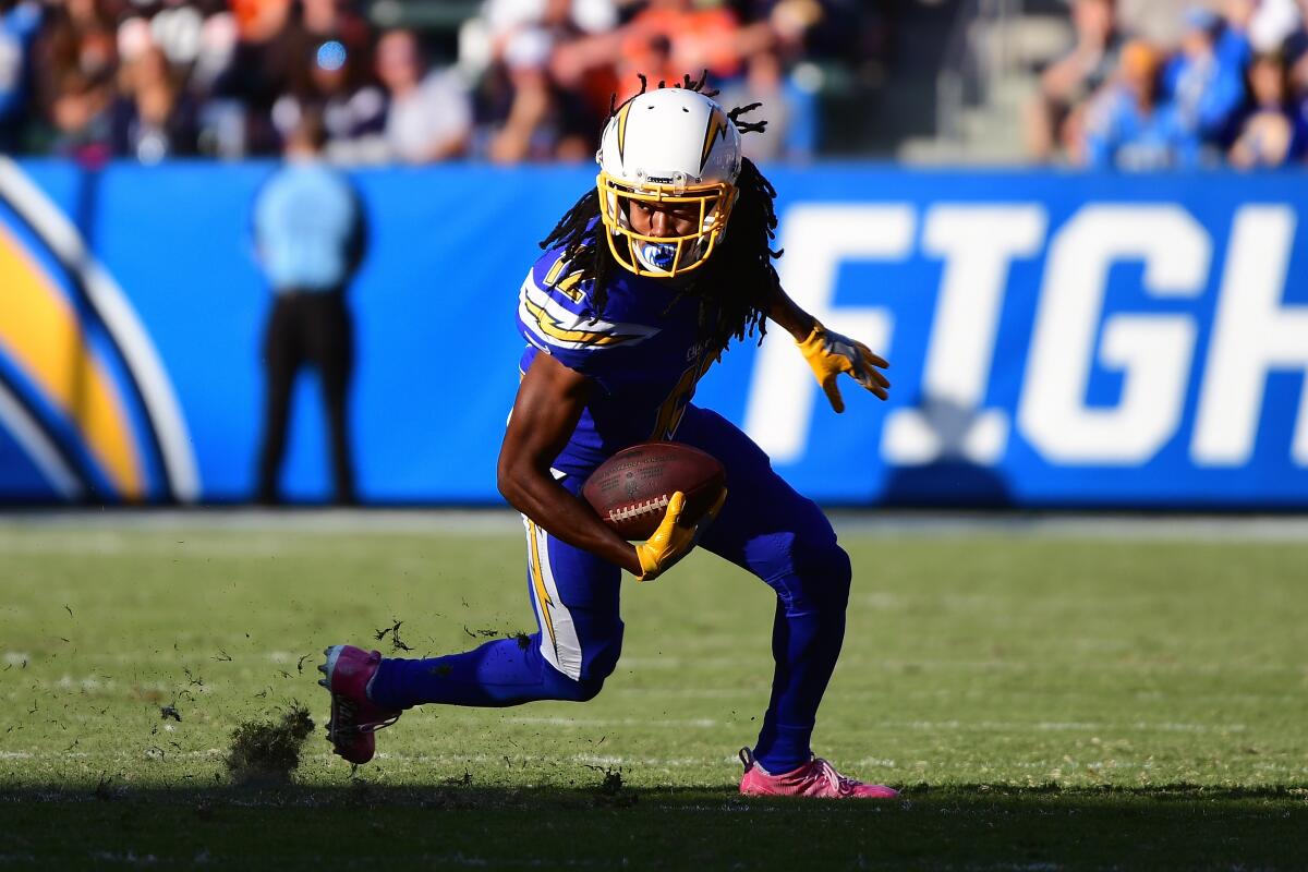 Chargers wide receiver Travis Benjamin runs with the ball during a game against the Cleveland Browns in December 2017.