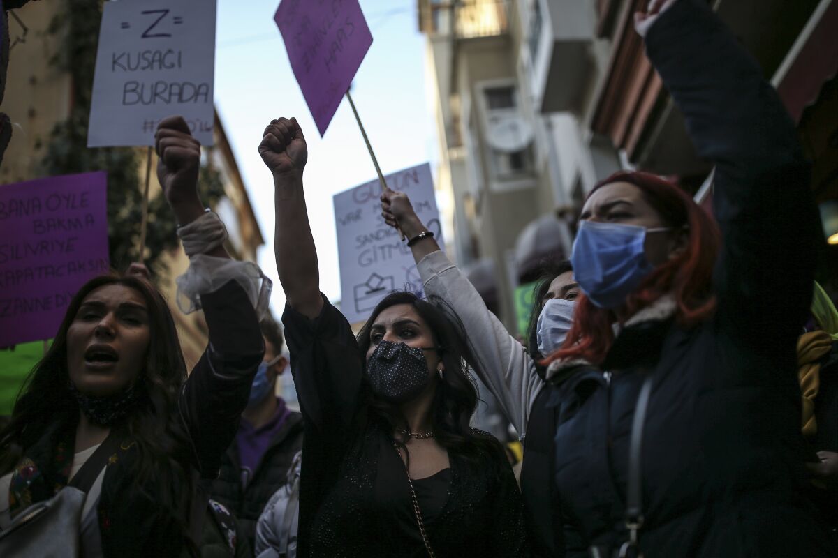 Protesters chant slogans during a rally to mark International Women's Day in Istanbul, Monday, March 8, 2021. 