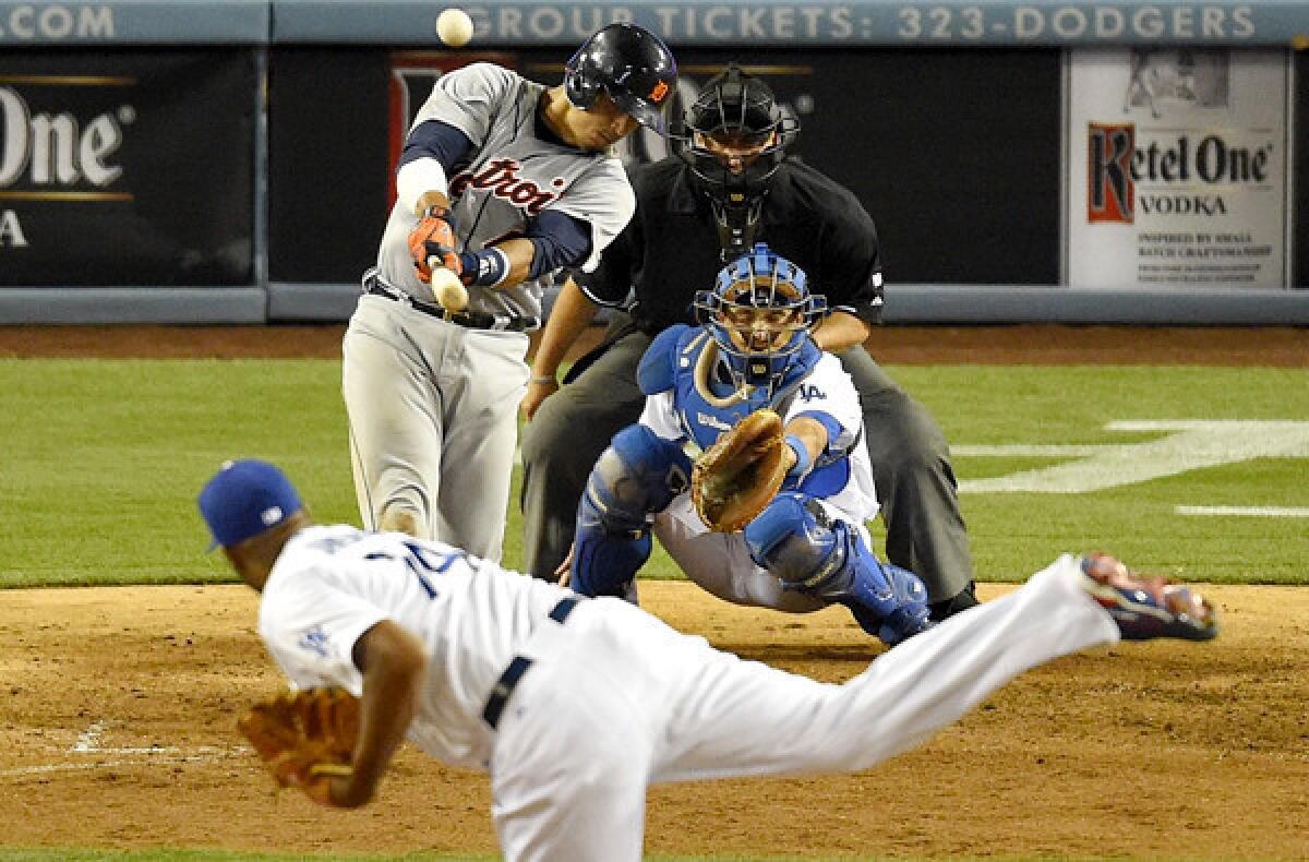 The Tigers' Victor Martinez hits a solo home run off Dodgers reliever Kenley Jansen in the 10th inning at Dodger Stadium.