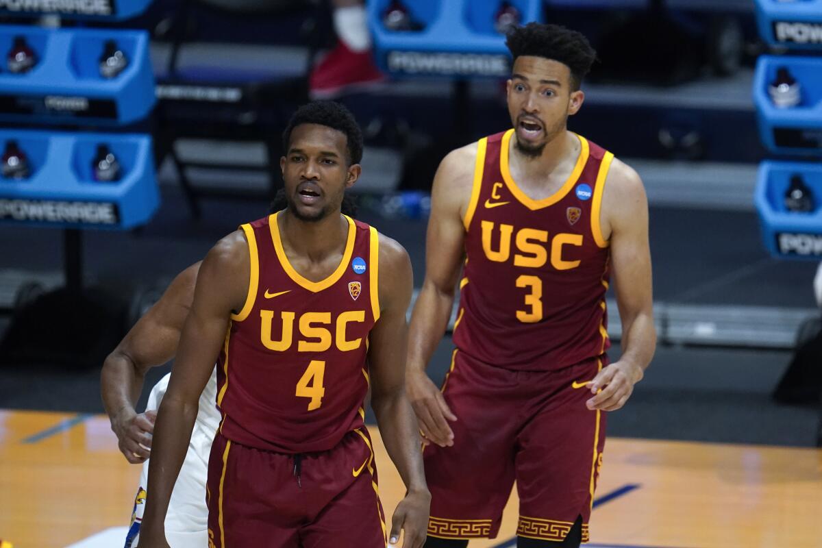 USC forward Evan Mobley and Isaiah Mobley watch against Kansas.