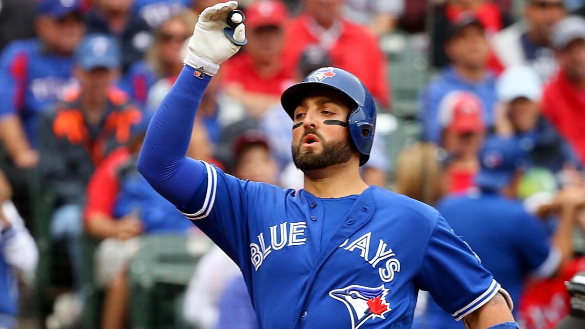 Blue Jays center fielder Kevin Pillar celebrates after hitting a home run against the Rangers in the fifth inning Friday afternoon.