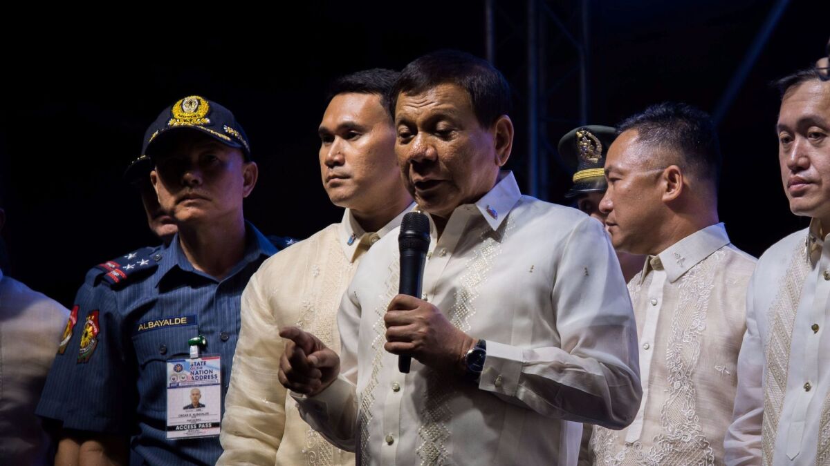 Philippine President Rodrigo Duterte speaks to protesters outside the House of Representatives in Manila last week.