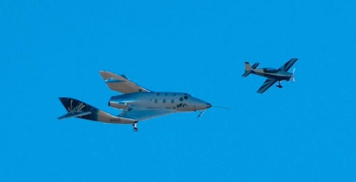 Virgin Galactic's VSS Unity comes in for a landing after its suborbital test flight on December 13, 2018, in Mojave, California.