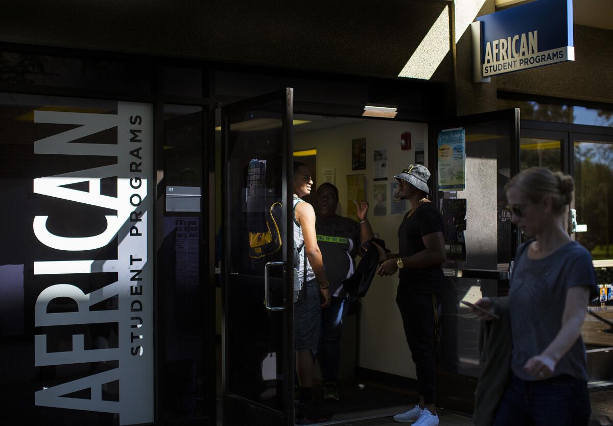 Students mingle outside the African Student Programs office at UC Riverside.