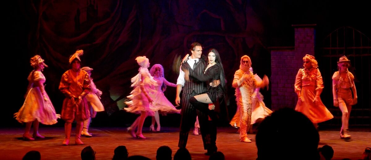 Gomez (Nick Siljander) and Morticia (Reese Taylor)