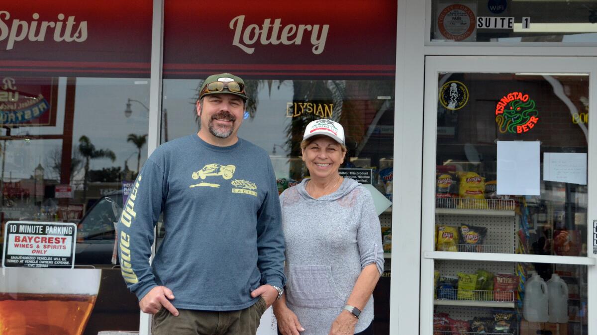 Bryan Nye and his mother, Sylvia Bice, who own Baycrest Caps & Corks Bottle Shop and Market in Costa Mesa, have expanded their grocery offerings in response to the coronavirus outbreak.