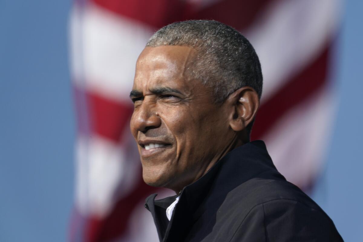 Former President Barack Obama speaks at a rally on Nov. 2, 2020, for Joe Biden at Turner Field in Atlanta. 