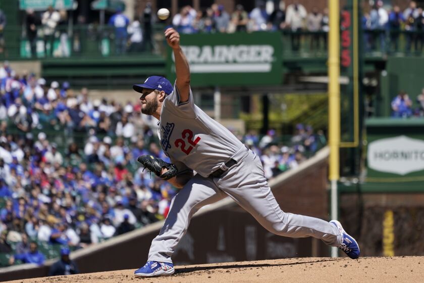 Los Angeles Dodgers starting pitcher Clayton Kershaw throws against the Chicago Cubs.