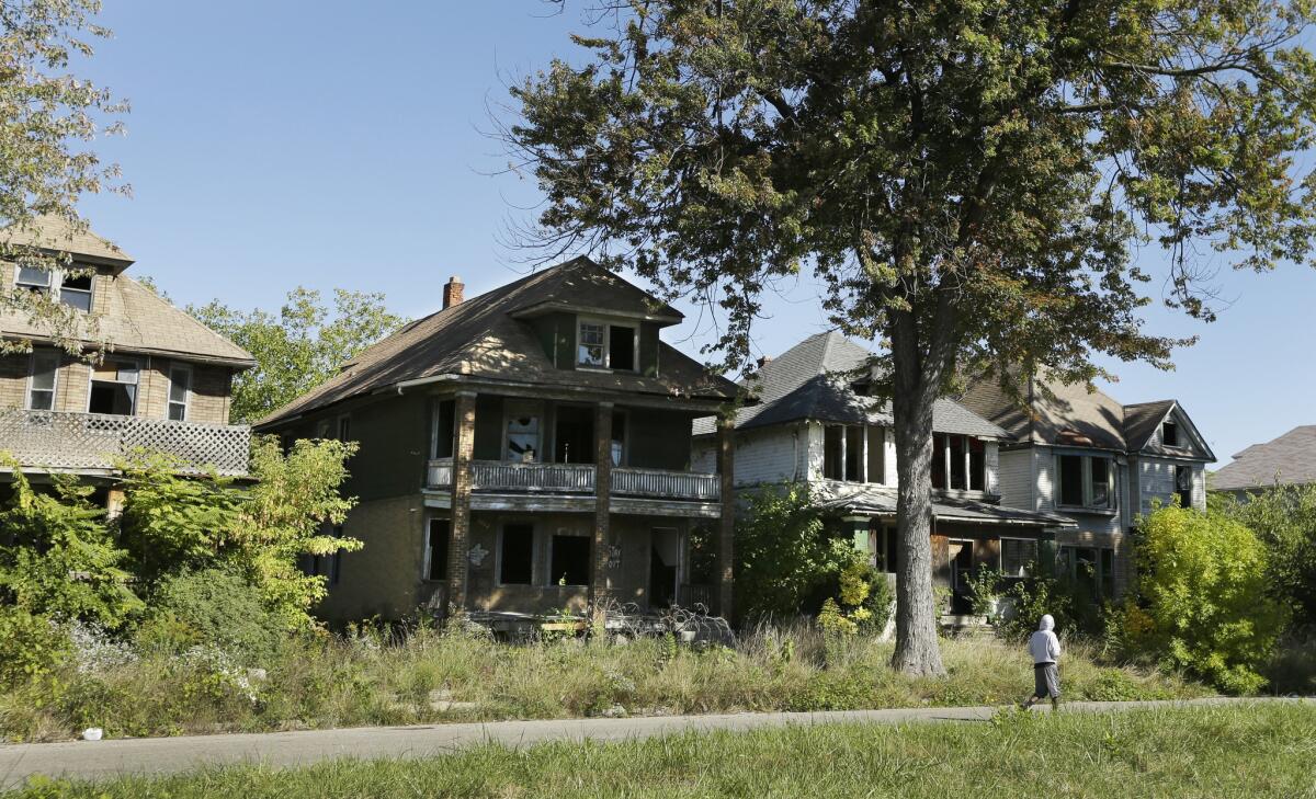 Thousands of boarded-up houses mar the Detroit cityscape.