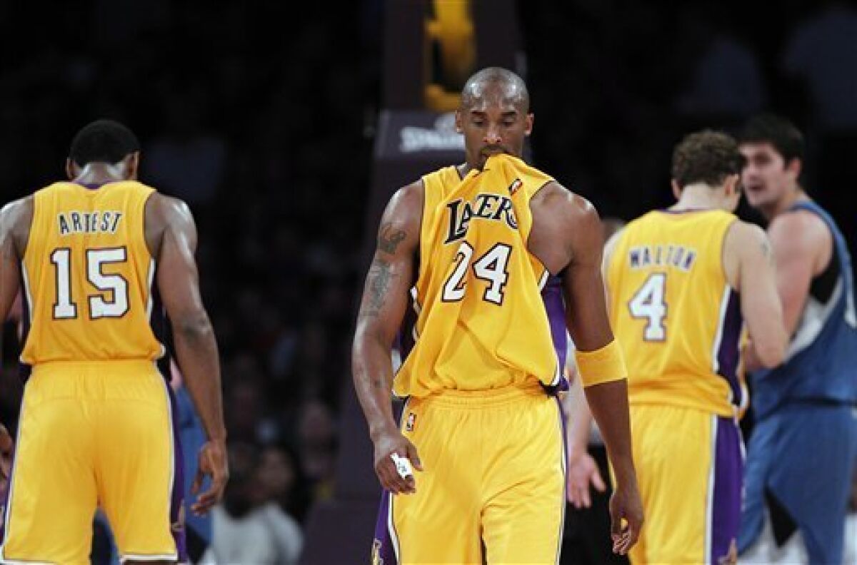 Los Angeles Lakers guard Kobe Bryant walks up the court during the first half of an NBA basketball game against the Minnesota Timberwolves in Los Angeles, Tuesday, Nov. 9, 2010. (AP Photo/Jae C. Hong)