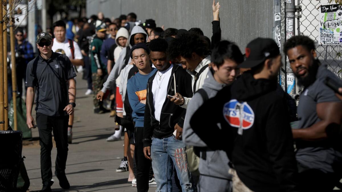 A long line builds Monday outside Supreme to sign up to purchase the spring/summer collection Thursday.