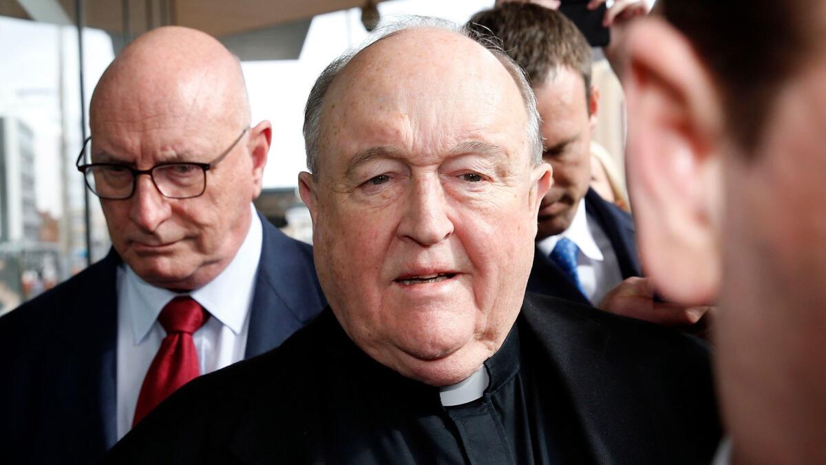 Archbishop Philip Wilson leaves after sentencing at Newcastle Local Court in Newcastle, Australia, on July 3.