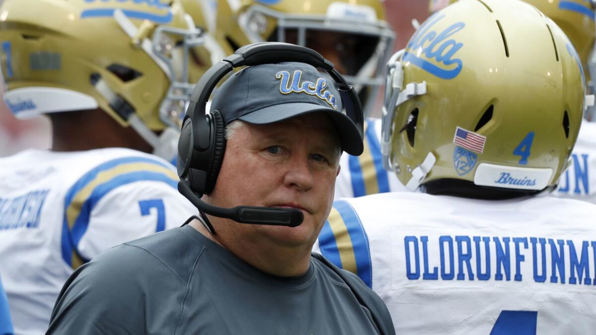 UCLA head coach Chip Kelly works the sideline during the second quarter of a game against Oklahoma.