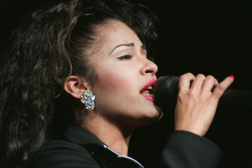 Latin singer Selena performing