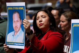 LOS ANGELES, CA - MARCH 30: People attend a rally staged by a coalition of friends, family, and colleagues working to bring Eyvin Hernandez home from what they term as unjustified imprisonment in Venezuela, held at Grand Park behind the Criminal Courts Building on Thursday, March 30, 2023 in Los Angeles, CA. (Gary Coronado / Los Angeles Times)
