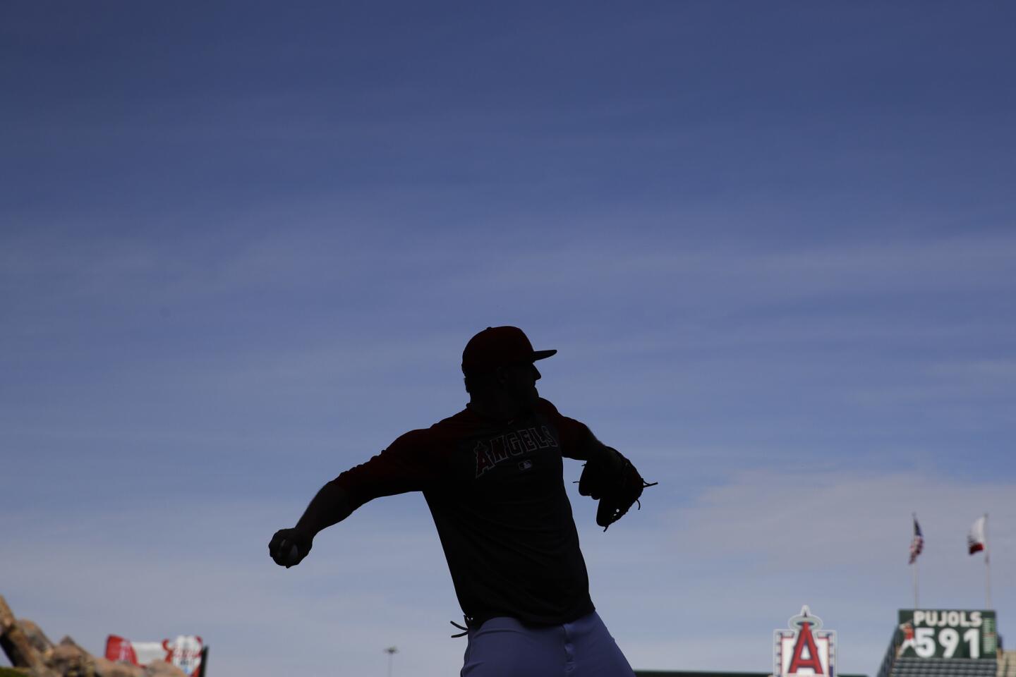 Los Angeles Angels' Mike Trout throws during warmups for a baseball game with the Seattle Mariners Friday, April 7, 2017, in Anaheim, Calif. (AP Photo/Jae C. Hong)