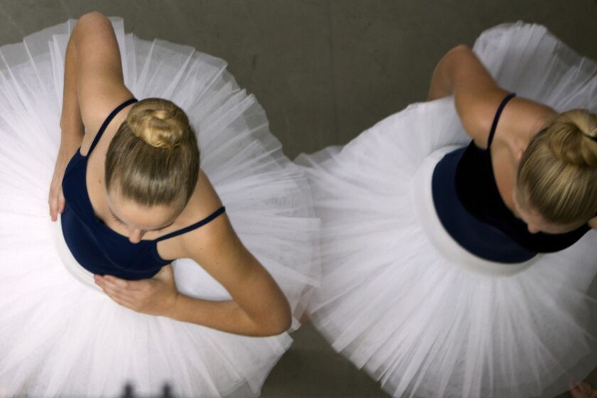 Dancers wait to go on stage during a dress rehearsal for "The Nutcracker" at the Westside School of Ballet in Santa Monica. The production will be held Nov. 30 and Dec. 1.