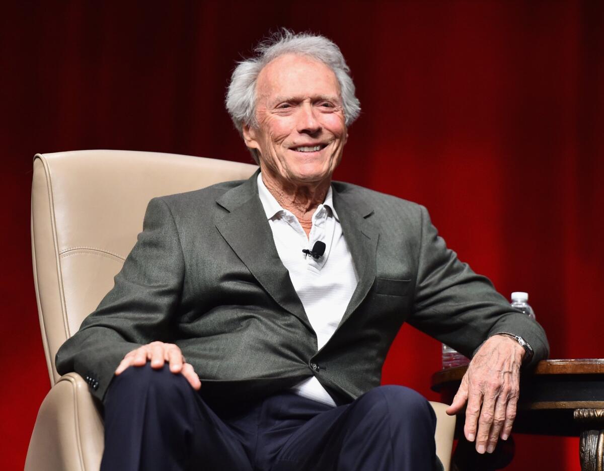 Recipient of the Fandango Fan Choice award for favorite film of 2014, "American Sniper's" Clint Eastwood speaks onstage during CinemaCon.