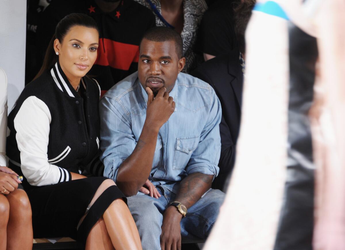 A restaurant in Brooklyn is hosting a Kim Kardashian and Kanye West-themed Valentine's Day dinner. Pictured are Kardashian and West at the Louise Goldin fashion show in New York City in 2012.