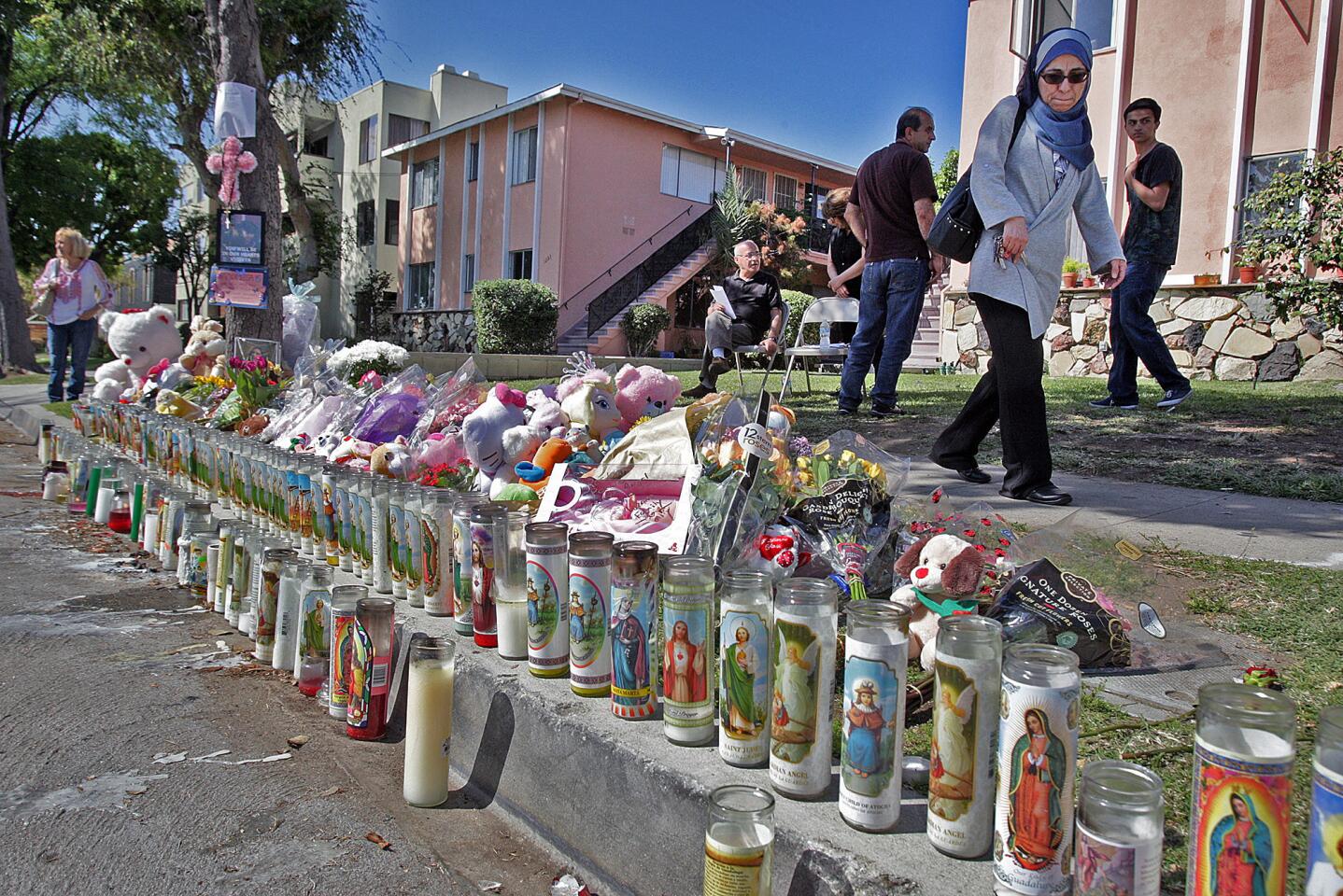 Photo Gallery: Roadside memorial for 4-year-old Violeta Khachaturyan fatally struck by oncoming vehicle