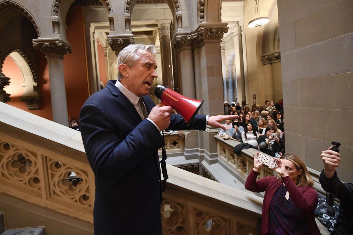 Robert F. Kennedy Jr. speaks at a rally against state bills that would require new doses of vaccines to attend school.