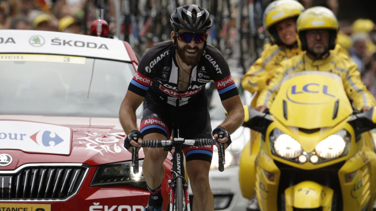 Simon Geschke sprints to the finish line to win the 17th stage of the Tour de France on Wednesday.