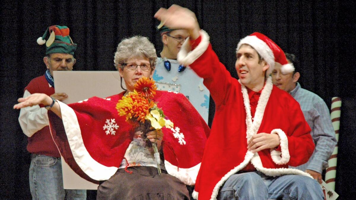 JoEllen Bosset and Joseph Vartanian play Mr. And Mrs. Santa Claus in the annual Holiday Program produced by BCR "a place to grow."