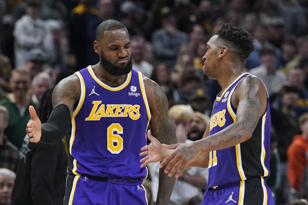 LeBron James rallies Lakers to overtime win over Pacers after suspension - Los Angeles Times