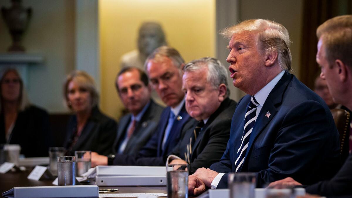 President Trump speaks about the hostages released from North Korea during a Cabinet meeting in Washington on May 9, 2018.