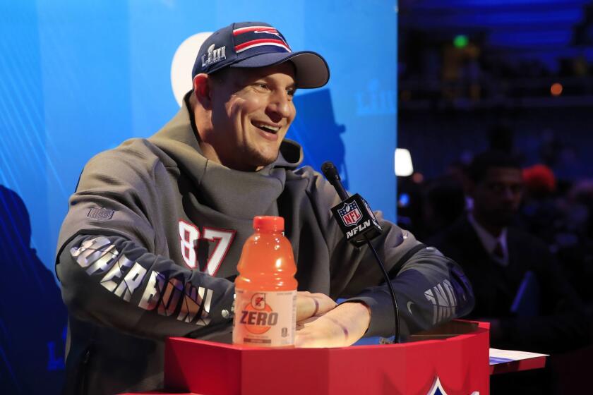 Mandatory Credit: Photo by TANNEN MAURY/EPA-EFE/REX (10075683at) New England Patriots tight end Rob Gronkowski speaks to the media during the Patriots session of the National Football League's Super Bowl LIII Opening Night event at State Farm Arena in Atlanta, Georgia, USA, 28 January 2019. The AFC Champion New England Patriots and the NFC Champion Los Angeles Rams will face off in Super Bowl LIII at Mercedes-Benz Stadium on 03 February 2019. Super Bowl LIII Opening NIght, Atlanta, USA - 28 Jan 2019 ** Usable by LA, CT and MoD ONLY **