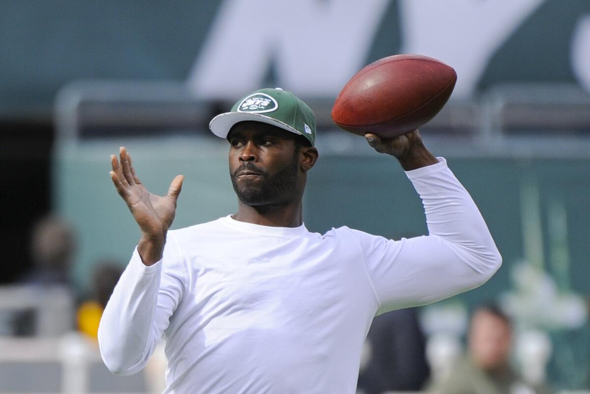 Former New York Jets quarterback Michael Vick warms up before a game against the Pittsburgh Steelers on Nov. 9.