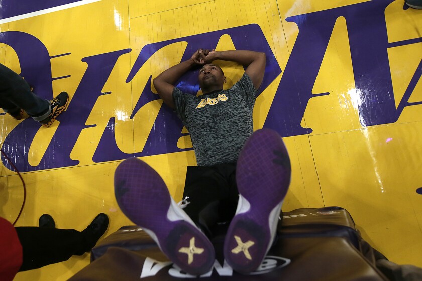 Lakers forward Metta World Peace stretches before a recent game at Staples Center.