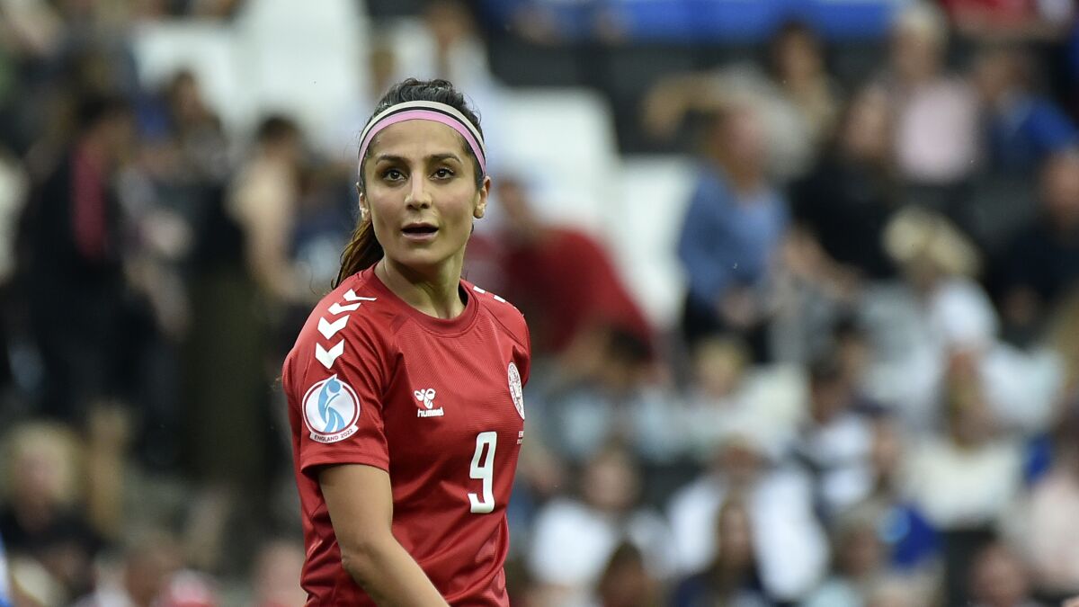 Denmark's Nadia Nadim appears to be in a Women's Euro 2022 game against Finland in July.