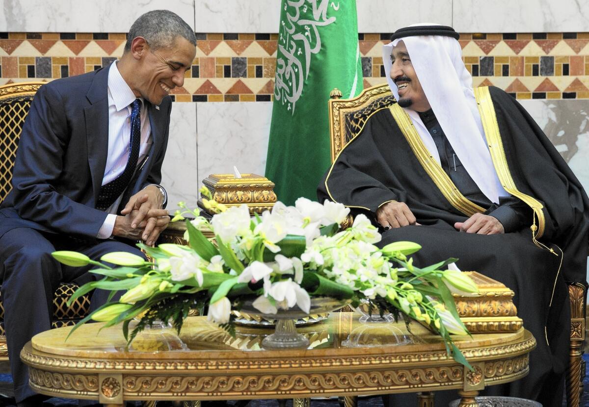 President Obama and King Salman of Saudi Arabia meet in Riyadh in January. Saudi officials say reports that the monarch is snubbing the White House in choosing to not attend a defense summit with Obama this week are "really off base."