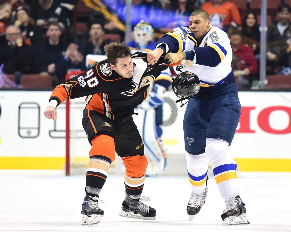 Ducks winger Jared Boll (40) and Blues winger Ryan Reaves squared off early in Sunday's physical game.
