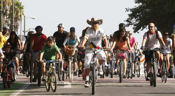 Cyclists pedal down Spring Street as thousands ride through downtown Los Angeles during CicLAvia.