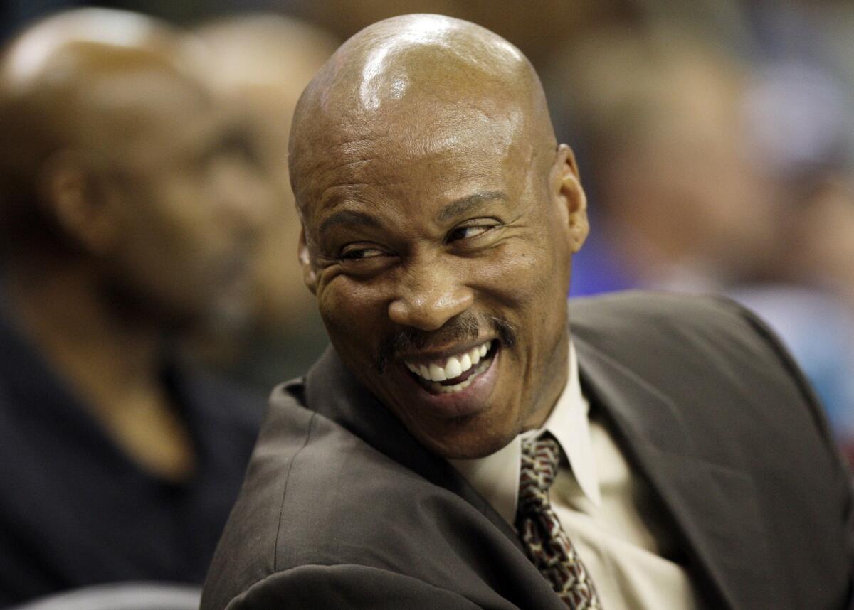 New Orleans Hornets Coach Byron Scott laughs during a game against the Memphis Grizzlies in December 2008.