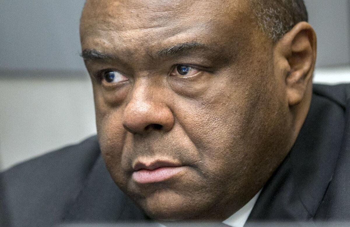 Former Democratic Republic of Congo leader Jean-Pierre Bemba waits in a courtroom of the International Criminal Court to hear the verdict on Monday.